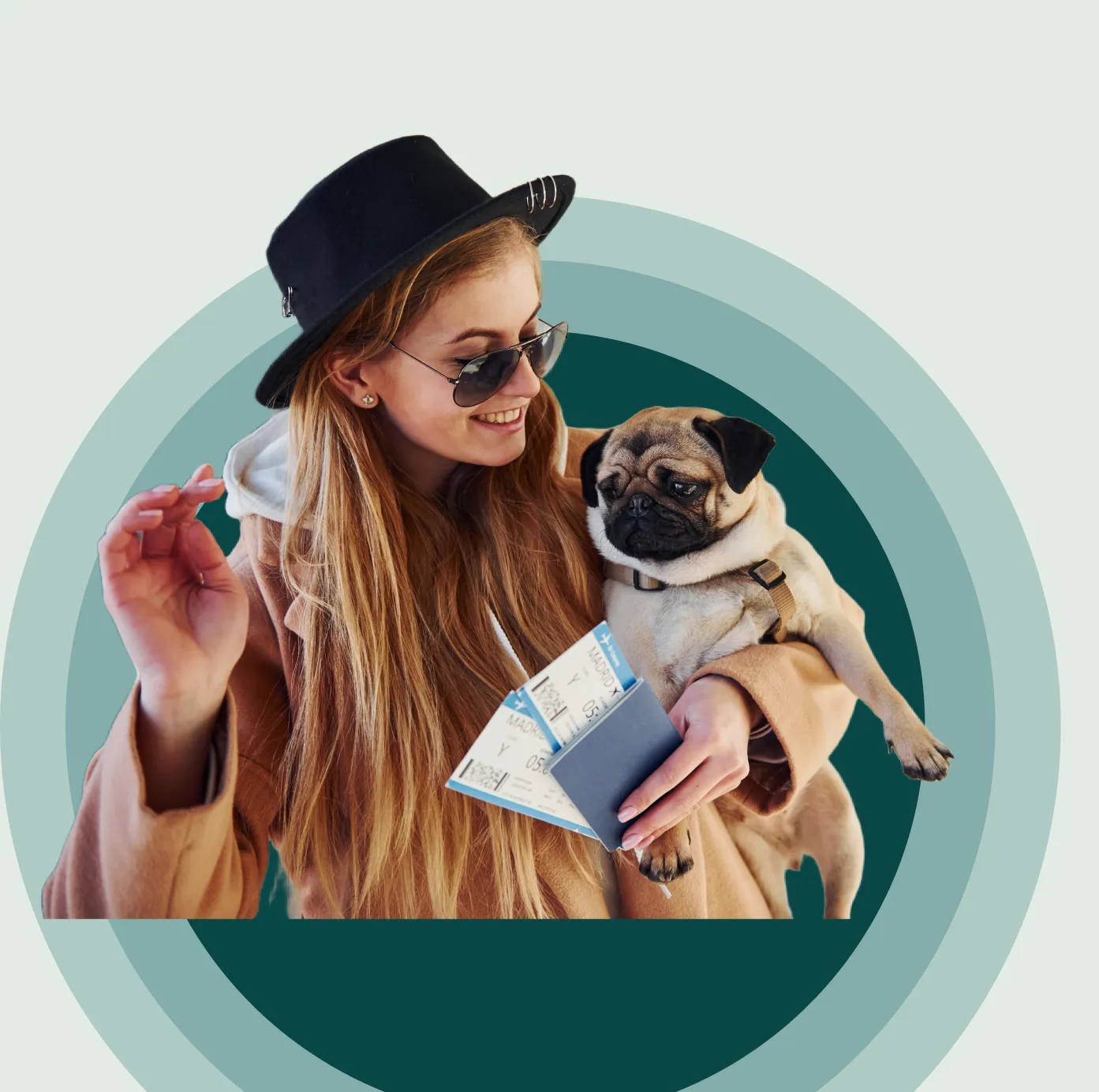 A traveler with their dog at the airport