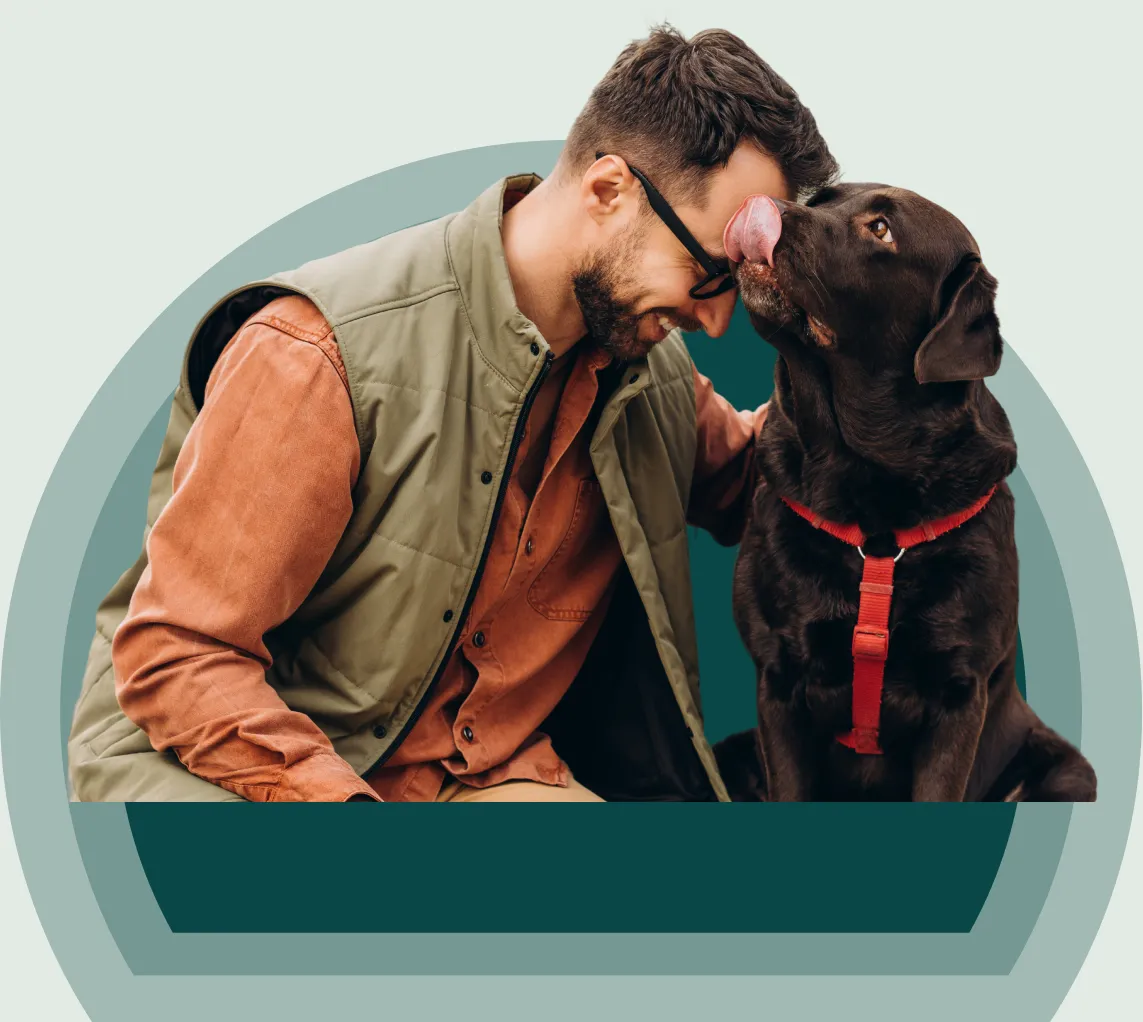 A person holding their emotional support animal
